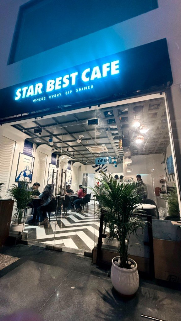 Star Best Cafe storefront at night