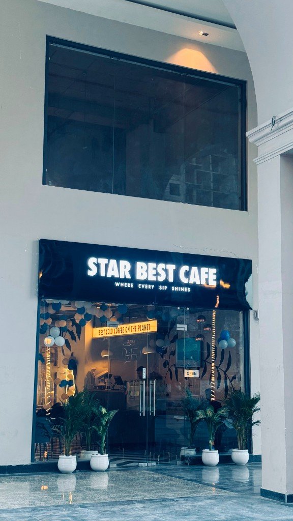 Star Best Cafe entrance and neon sign
